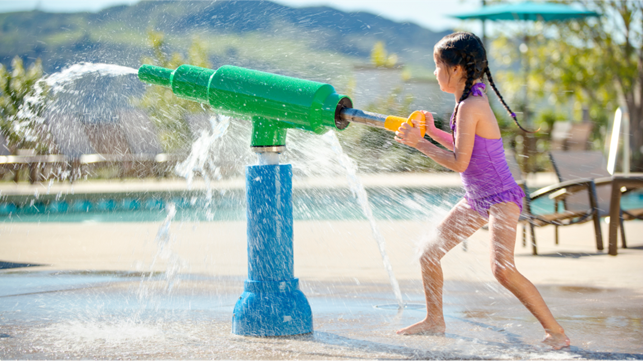 Girl shooting watergun